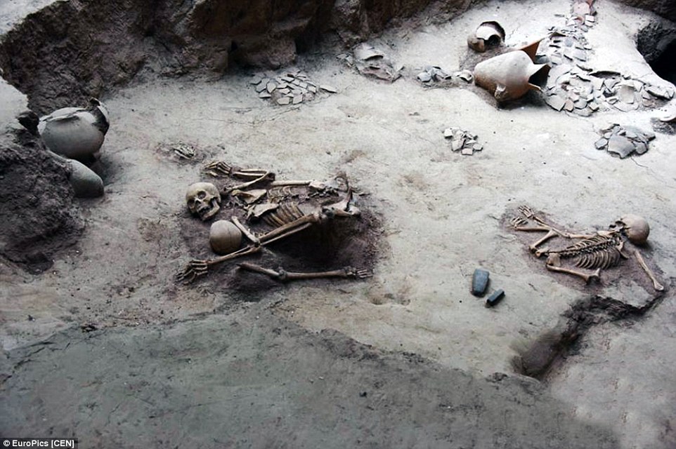 4,000-year-old skeletons of mother and child found in in Qinghai locked in  embrace | Daily Mail Online