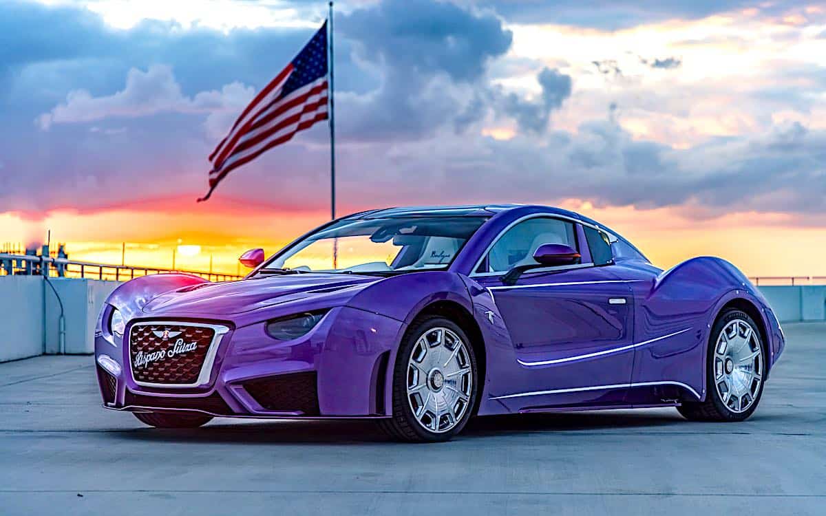 Hispano Suiza Carmen Boulogne in front of American flag at sunset