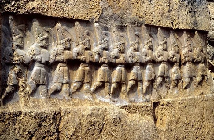 This carving at Yazilikaya is said to depict 12 gods of the underworld. Credit: Public Domain