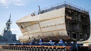 Unleashing the Giants: The Incredible Feat of Building and Launching the World's Largest Ships (Video).