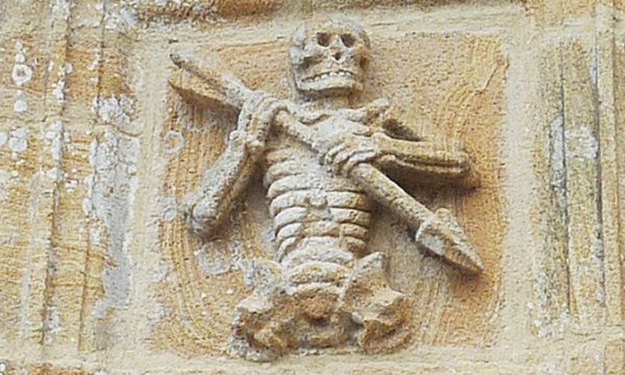 Ankou, depicted on a carving at the ossuary of the chapel of St Joseph at Ploudiry, Brittany; Image credit: Moreau.henri  - CC BY-SA 3.0