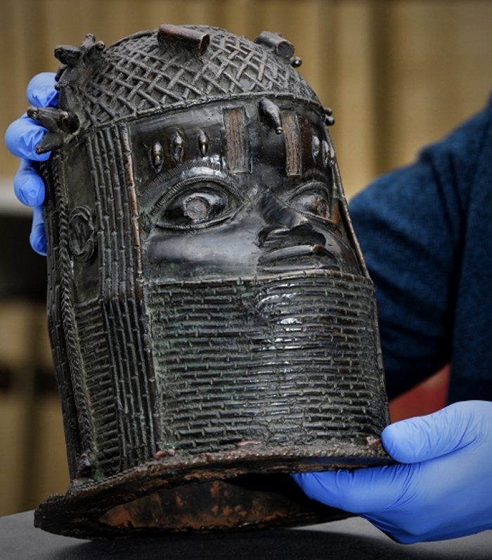 The Benin bronze - a sculpture depicting the head of an Oba (king)