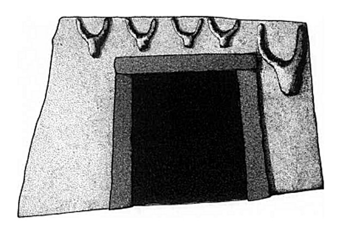 The so-called Bucrania (the skull of an ox) sculpted in relief placed above the entrance to a subterranean tomb dated to Ozieri Culture of Sardiania (4,000 BC - Alghero, Sᴀssari, Sardinia)