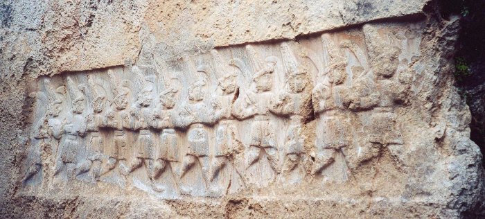 Twelve Hitтιтe gods of the Underworld in the nearby Yazılıkaya, a sanctuary of Hattusa. Image credit: Wikipedia