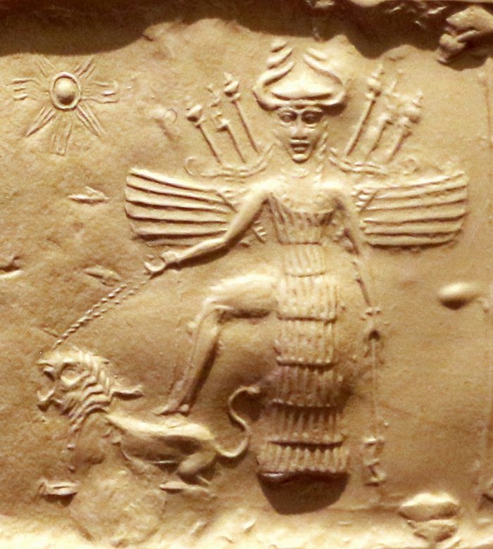 Goddess Ishtar (Inanna) on an Akkadian Empire seal, 2350–2150 BC. She is equipped with weapons on her back, has a horned helmet, and is trampling a lion held on a leash.