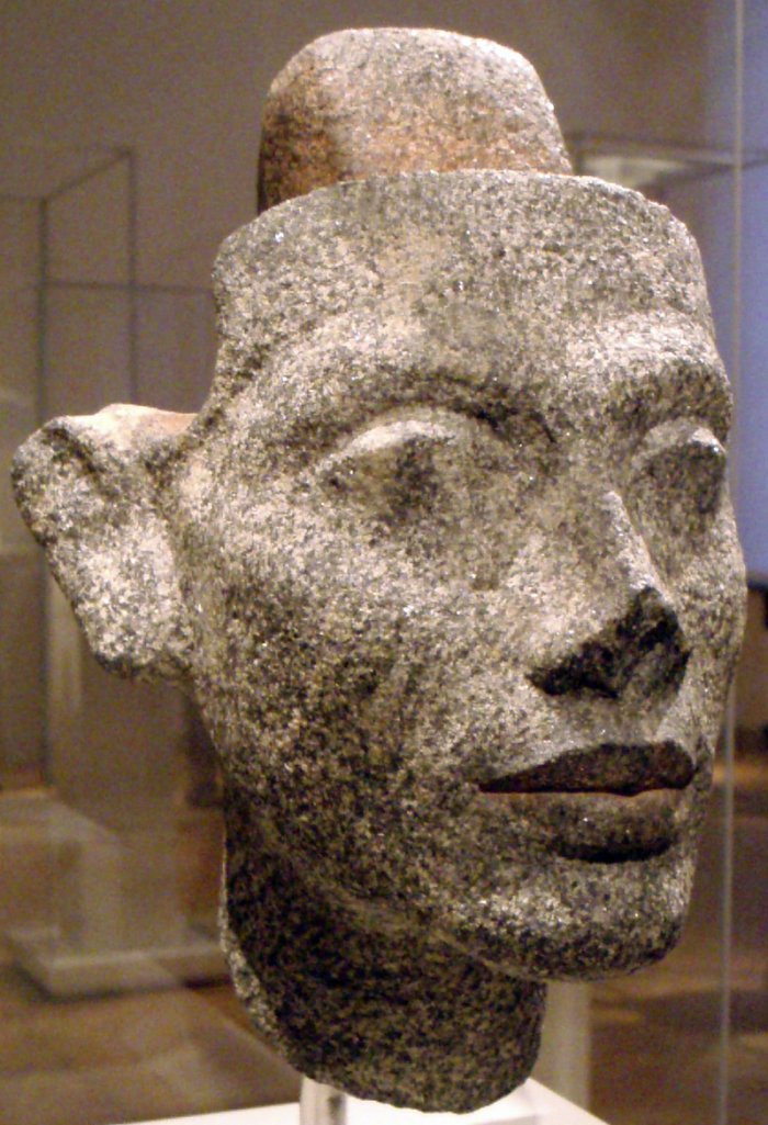 Granite head statue of Neferтιтi. The securing post at head apex allows for different hairstyles to adorn the head. Altes Museum, Berlin.