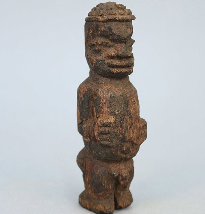 Small carved wooden male figure, listed as originating from the ‘Benin West Africa Expedition 1897’.