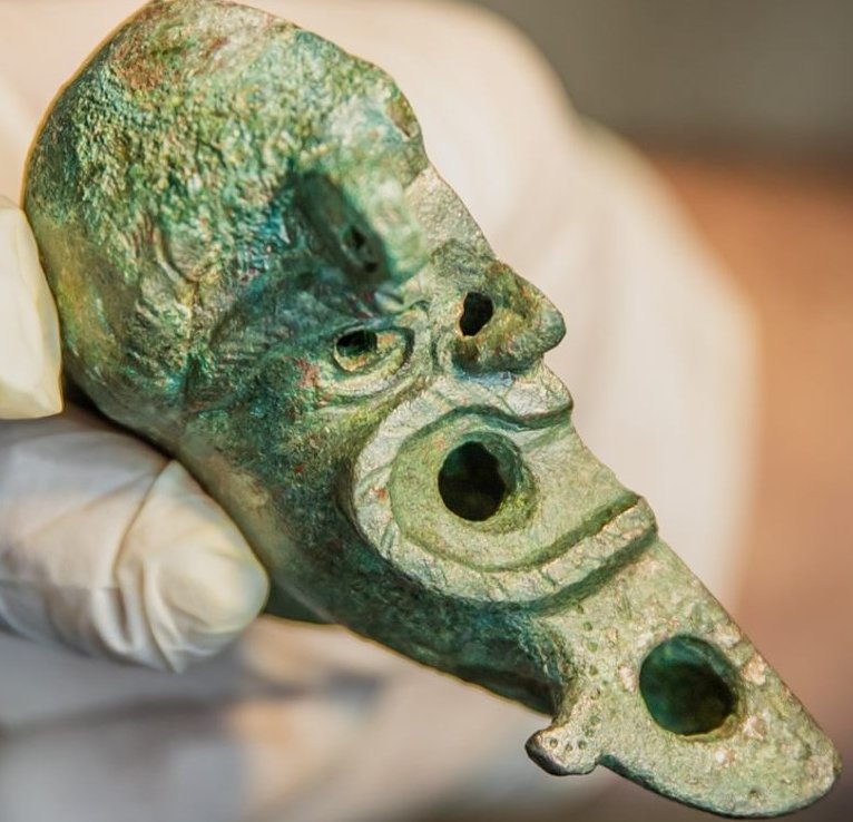 Rare bronze oil lamp with a face cut in half unearthed in Israel. Credit: Koby Harati, City of David; Eliyahu Yanai, City of David; Dafna Gazit, Israel Antiquities Authority