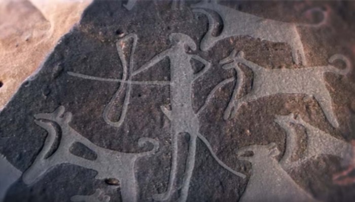 World's Oldest Evidence Of Dogs Wearing Leashes Could Be 8,000-Year-Old Rock Carvings