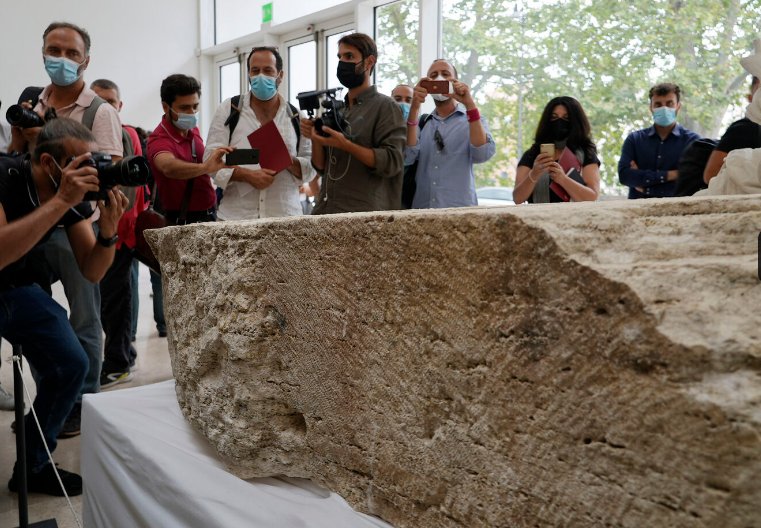 PH๏τographers take pictures during the presentation to the press of an archeological finding that emerged during the excavations at a Mausoleum in Rome, Friday, July 16, 2021. (AP PH๏τo/Domenico Stinellis)