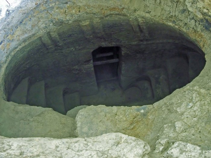 Entrance to the underground tomb with spiral staircase