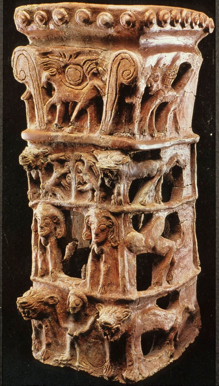 This four-tiered cult stand found at Tanaach is thought to represent Yahweh and Asherah, with each deity being depicted on alternating tiers. PH๏τo: © The Israel Museum, Jerusalem/Israel Antiquities Authority (pH๏τograph by Avraham Hay).